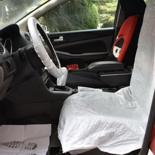 Disposable plastic seat cover – roll pack and dispenser view